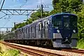 Set 9108 in all-over blue livery in July 2023