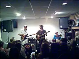 Semisonic performing in a 2006 basement concert. L-R: Munson, Wilson, and Slichter