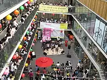 Musical performance at a multi-level market