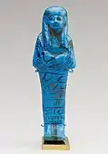 Shabti of Paser, the vizier of Seti I and Ramesses II; 1294–1213 BC; faience; height: 15 cm, width: 4.9 cm; Metropolitan Museum of Art (New York City)