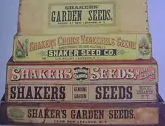 Stack of reproduction replicas of Shaker wooden display boxes