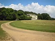 The approach to the hall along the southern driveway.