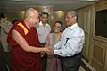 Prabodh Kirtilal Mehta, Rashmi Kirtilal Mehta and Rekha Sheth with the Dalai Lama