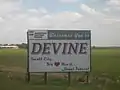 2008 picture of Devine entrance sign: "Small City, Big Heart, Great Future"