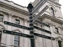 Image 34A signpost on Parliament Square with directions for nearby attractions (from Tourism in London)