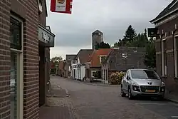 Village street with the water tower in the background