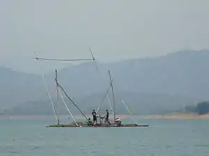 The Phi Pan Nam mountains near the Sirikit Dam. The haze caused by wildfires is prevalent during the dry season