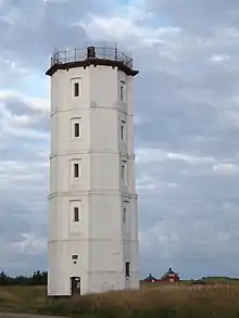 The retired Skagen's White Lighthouse in Skagen, North Judland, Denmark. On the roof is the fire basket once used as a beacon.