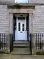 Main entrance, with a nod to its appearance in All Creatures Great and Small visible above the door