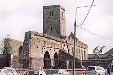 Walls and tower of a ruined church