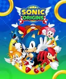 Six cartoon characters are emerging from a large golden ring. Clockwise from the top are Dr. Eggman, a scientist with a large mustache; Amy Rose, a pink hedgehog; Knuckles, a red echidna; Sonic, a blue hedgehog; Tails, a two-tailed fox; and Metal Sonic, a blue robot resembling a hedgehog. The title "Sonic Origins" is positioned above them.