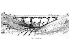 Sonning Cutting, close to the scene of the accident, 24 December 1841. Workmen appear to be repairing bank-slips on the southern side of the cutting at left. Print by JC Bourne published in 1846