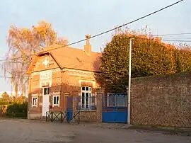 The town hall and school in Sourdon