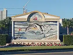 The welcome sign bearing the seal and motto of South Pasadena, Florida.