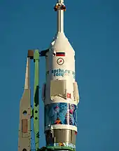 Close-up view of Soyuz capsule adorned with the Sochi Olympics logo