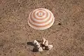 The Soyuz TMA-21 spacecraft lands in central Kazakhstan.