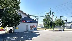 Two-story building with gabled roof