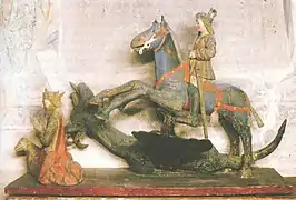 Mediaeval carving of St. George and dragon, from Hattula churchKari Tarkiainen, Sveriges Österland, p. 93.