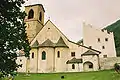 Abbey church with tower home (right)