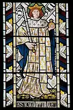 The French saint King Louis IX in the stained glass of the East window of All Saints Church, Cambridge