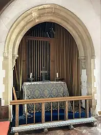 The organ chamber of 1912 with the north aisle altar