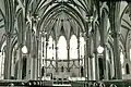 Gothic Revival style vaults, chancel, and altar