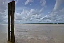 The Coppename River with the bridge in the distance