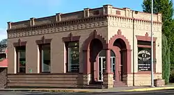 Photograph of the State Bank of Kamiah, a single-story brick building on a street corner