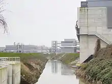 The Senne leaving the Brussels-North water treatment plant near Buda bridge in Haren