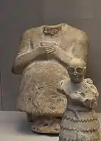 Statue of Iku-Shamash, King of Mari circa 2400 BCE (in the rear)