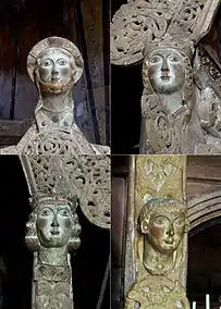 Heads of baldachin in stave church Hopperstad