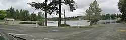 A lake and parking lot