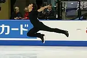 Stephane Lambiel performs a stag jump.