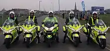 St John livered ambulance motorcycles parked at the blue start for Virgin London Marathon 2010.