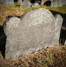 Early schist grave marker carved by John Hartshorne