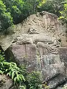 Stone carving of Maitreya in Gaoming Temple.