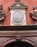 Inscription over the front door of 20 quoting Psalm 37:5 in German: "Befiehl dem Herrn deine Wege und hoffe auf ihn, er wirds wohl machen". English translation: "Commit thy way unto the Lord; trust also in Him, and He will bring it to pass."