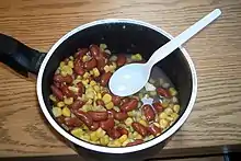 Succotash, a stewed mixture of corn with lima or other kinds of beans.