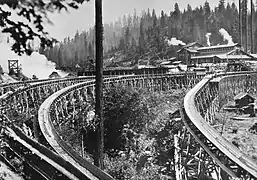 Several flume sections leave the mill to converge into one v-shaped trough for the 54-mile run to Madera, California.