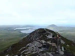 Summit of Diamond Hill and view west, with Tully Mountain (right)