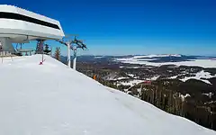 View of the Sunrise High-Speed Quad at the top of Sunrise Peak (10,700')