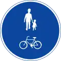 Compulsory track for pedestrians, cyclists and moped drivers.