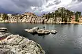 Rock wall damming the northwest side of Sylvan Lake