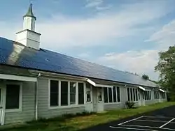 A building of the Seven Hills School in the township