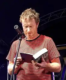 Tadej Golob reading from his book Jezero (Novo Mesto, August 2018)