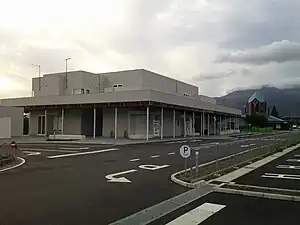 Current station building and old station building (May 2023)