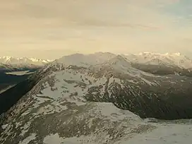 A view of the southern end of the Takshanuk Mountains. The Chilkat River can barely be glimpsed in the lower lefthand corner.