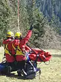 HFRS technicians preparing for takeoff in tandem with an aerial rescue platform (used to evacuate injured subjects)