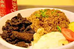 Tapsilog, a common Filipino breakfast made of egg, rice, and beef or venison