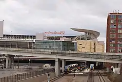 View of the commuter platform in front of the nearly-complete Target Field.  The upper light-rail platforms are obscured by bridges.